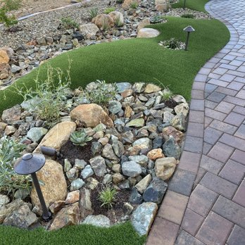 Trinity Landscaping - Entrance walkway with artificial turf grass accents. - Landscape Architects or Designers Near Me - Mesa, Arizona Trinity Landscaping - Entrance walkway with artificial turf grass accents. - Landscape Architects or Designers Near Me - Mesa, Arizona