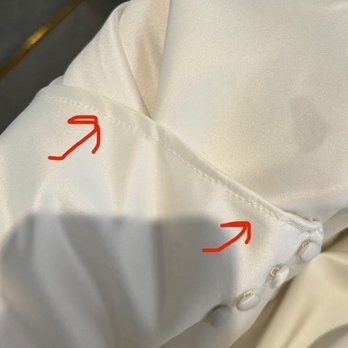 Creative Notions - Close up of the sleeve hem- looks like a child sewed it. Totally unprofessional - Sewing & Alterations Near Me - Manchester, Connecticut