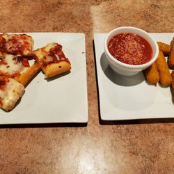 Sorrento's Restaurant & Banquet Hall - Pizza pieces and cheesesticks