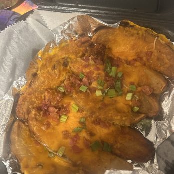 Logan's Roadhouse - Made-From-Scratch Loaded Potato Skins - Steakhouses Near Me - Spring Hill, Tennessee Logan's Roadhouse - Made-From-Scratch Loaded Potato Skins - Steakhouses Near Me - Spring Hill, Tennessee