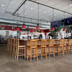Reba's - Bar feature within the seating lounge. Ice cream parlor is the back corner. Featuring mean old cashier