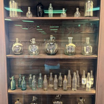 Martinelli's Company Store - Display of old Martinelli bottles. - Souvenir Shops Near Me - Watsonville, California
