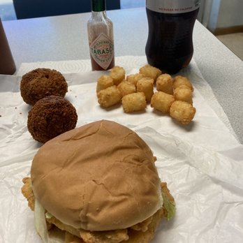 Bayou Blue PO Boys - Fish on a bun, small tater tots, and boudin balls. - American Near Me - Houma, Louisiana Bayou Blue PO Boys - Fish on a bun, small tater tots, and boudin balls. - American Near Me - Houma, Louisiana