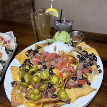 Stolen Saddle - Brisket Nachos - Bars Near Me - Chicago, Illinois