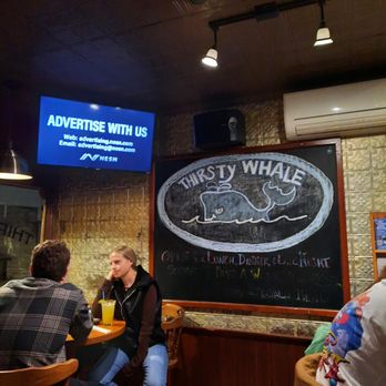 Thirsty Whale - Seating with signage - American Near Me - Bar Harbor, Maine Thirsty Whale - Seating with signage - American Near Me - Bar Harbor, Maine