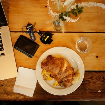Whealth Kitchen - Bacon egg & cheese on a croissant w/ Sriracha - Breakfast & Brunch Near Me - Jersey City, New Jersey