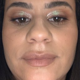 This was the "professional" makeup that was done to me. Didnt even cover my blemish. Yes, i look awful!