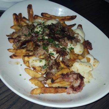 Maize + Mash - Poutine. Tasty, but $12 for a small portion. - Southern Near Me - Glen Ellyn, Illinois Maize + Mash - Poutine. Tasty, but $12 for a small portion. - Southern Near Me - Glen Ellyn, Illinois