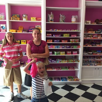 Pixie's Candy Parlour - a woman and two children - Candy Stores Near Me - Calgary, Alberta