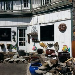 F P Kolbe - Flowerpots and ornaments at the front of the building