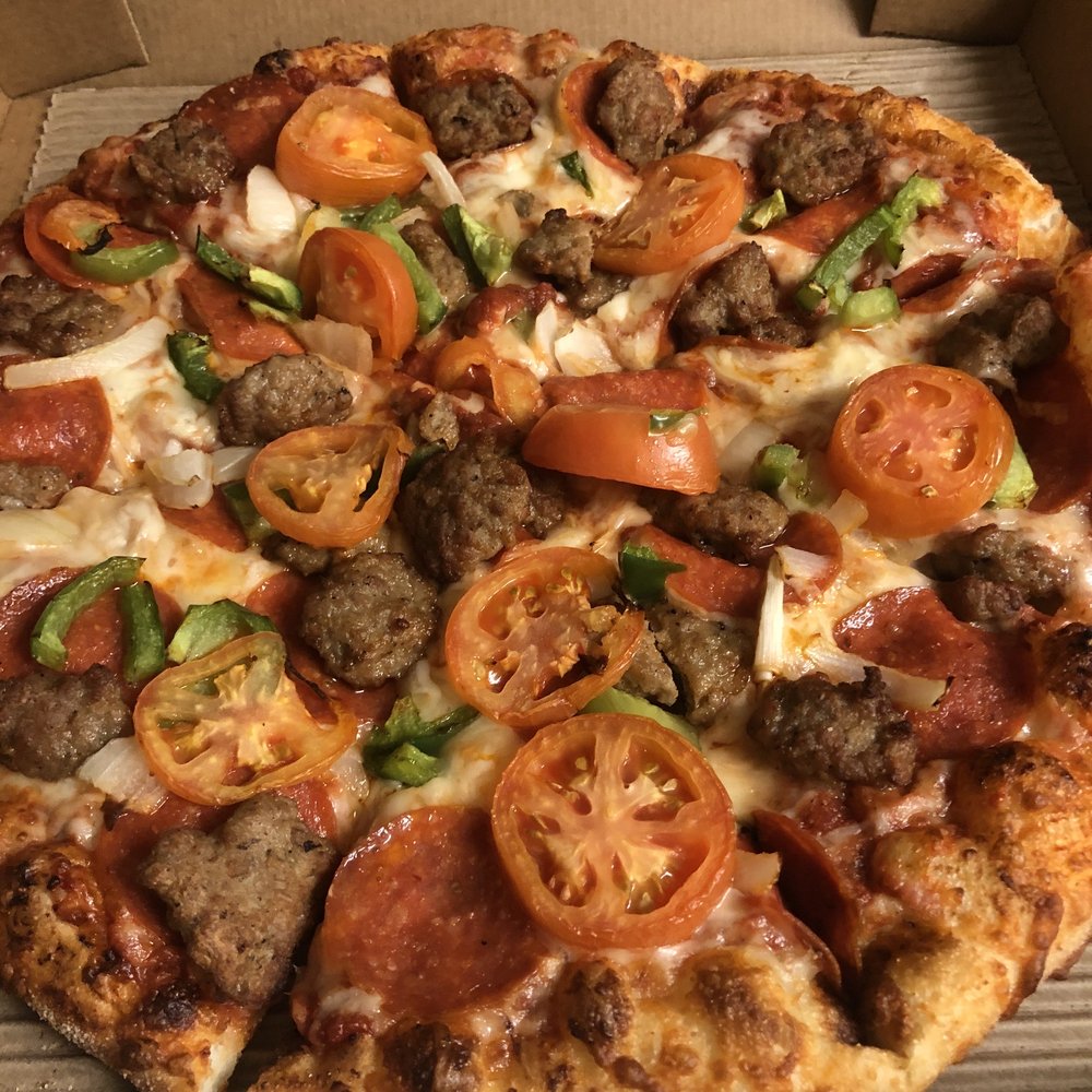 Deluxe Pizza mushrooms add tomatoes
