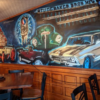 Studebaker Brewing Company - a mural of old cars - Breweries Near Me - South Bend, Indiana