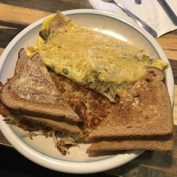 Garden omelet with hash browns and wheat toast
