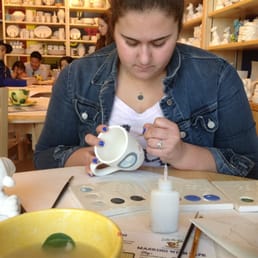 Christina making a special mug for her dad