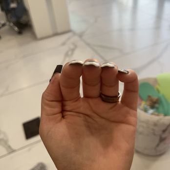 Elegant Nails - Super thin and acrylic all over my thumb. - Nail Salons Near Me - Las Cruces, New Mexico