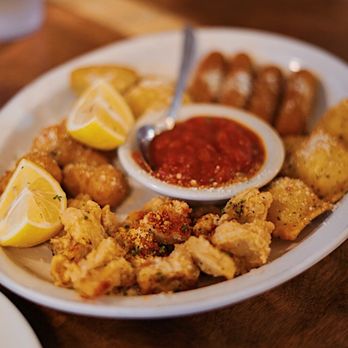 Cafe Sicilia - a plate of food on a table - Italian Near Me - Bedford, Texas