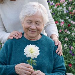 Acti-Kare Responsive In-Home Care - Caregiver and Senior in the Garden
