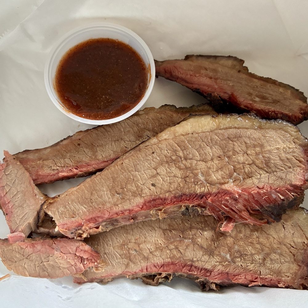 Shorty's BBQ - 1/2 lb. Smoked brisket with spicy BBQ sauce on the side - Yummmm! - Caterers Near Me - Camas, Washington Shorty's BBQ - 1/2 lb. Smoked brisket with spicy BBQ sauce on the side - Yummmm! - Caterers Near Me - Camas, Washington