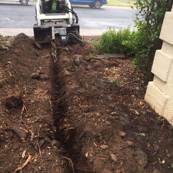 Clayton's Bobcat Services - Redwood roots? No problem for the trench bobcat. - Junk Removal & Hauling Near Me