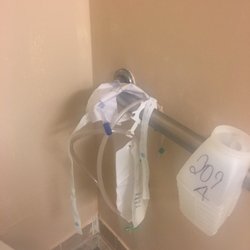 Alaris Health At Riverton - This was left in the bathroom. A used tube and bag with urine should be discarded.
