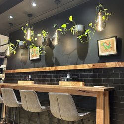 Imago Bakery & Patisserie - Ambience- lighting, plants and paint tones on point.