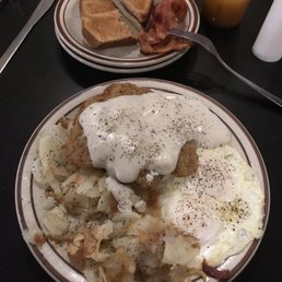 Country Chicken Fried Steak, toast and a side of bacon Country Chicken Fried Steak, toast and a side of bacon