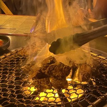 Nangman BBQ - Server cooking the meat - Korean Near Me - New York, New York Nangman BBQ - Server cooking the meat - Korean Near Me - New York, New York