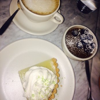 True Food Kitchen - Cappacino with soy, vegan key lime pie and vegan coconut flan with berries. - Vegetarian Near Me - Naples, Florida True Food Kitchen - Cappacino with soy, vegan key lime pie and vegan coconut flan with berries. - Vegetarian Near Me - Naples, Florida