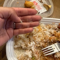 White rice with unknown fibers or hairs inside! White rice with unknown fibers or hairs inside!