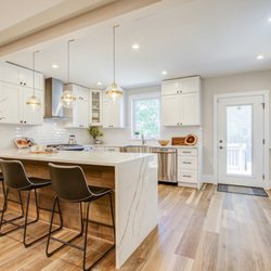 Pi Kitchen and Bath Shop - Kitchen remodeled with extra dinning space, countertops and cabinets