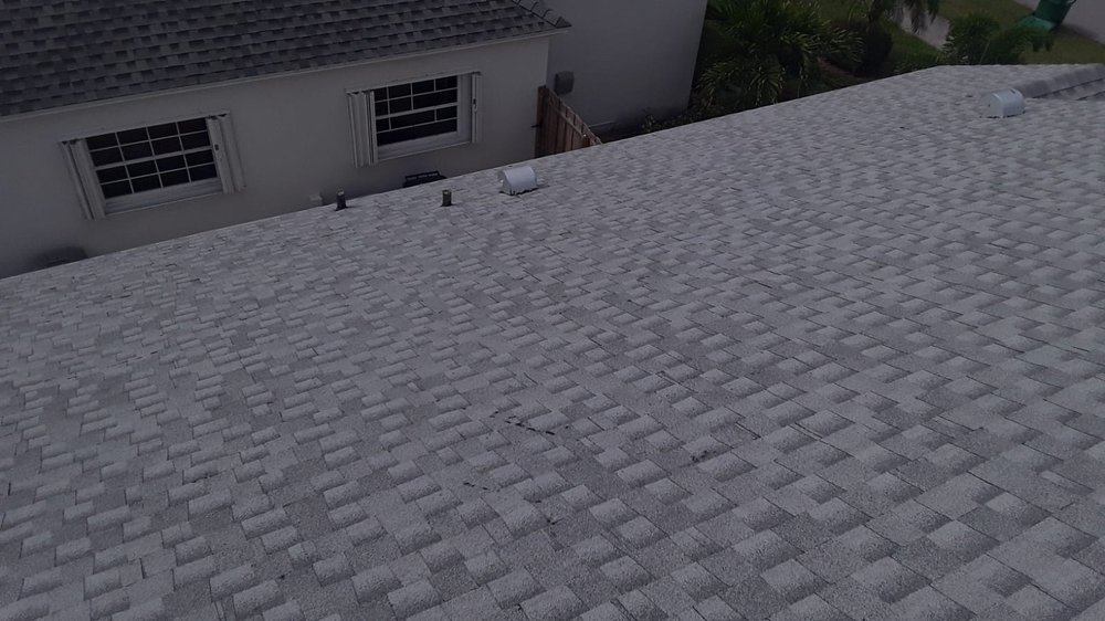 Slide of The Roof Xperts