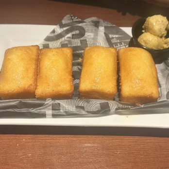 Smokey Bones - Cornbread - 4 Pieces - Barbeque Near Me - Orlando, Florida Smokey Bones - Cornbread - 4 Pieces - Barbeque Near Me - Orlando, Florida
