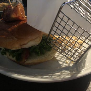 Dave & Buster's Cary - Burger sliding off the bun. Basket was empty cause the fries tipped over and fell out. This is how we received our plate. - Sports Bars Near Me - Cary, North Carolina Dave & Buster's Cary - Burger sliding off the bun. Basket was empty cause the fries tipped over and fell out. This is how we received our plate. - Sports Bars Near Me - Cary, North Carolina