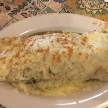 Servando's - Pork burrito with green sauce....be prepared tho, it's not chili verde it's a red cinnamon-ish pork inside! - Mexican Near Me - Winter Garden, Florida Servando's - Pork burrito with green sauce....be prepared tho, it's not chili verde it's a red cinnamon-ish pork inside! - Mexican Near Me - Winter Garden, Florida