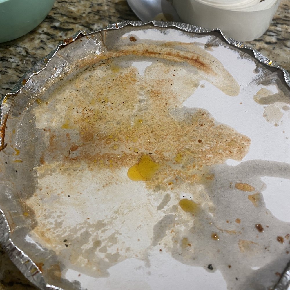 Napoli's Rowlett - Cover of lasagna dish with grease soaking through. - Italian Near Me - Rowlett, Texas Napoli's Rowlett - Cover of lasagna dish with grease soaking through. - Italian Near Me - Rowlett, Texas