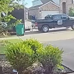 Swan's Moving & Storage Co - Swan moving service blocking trash bin on trash day.