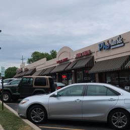 Their narrow strip mall with a single row of parking. Their narrow strip mall with a single row of parking.