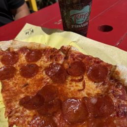 2 slices of pizza and a nice refreshing soda 2 slices of pizza and a nice refreshing soda