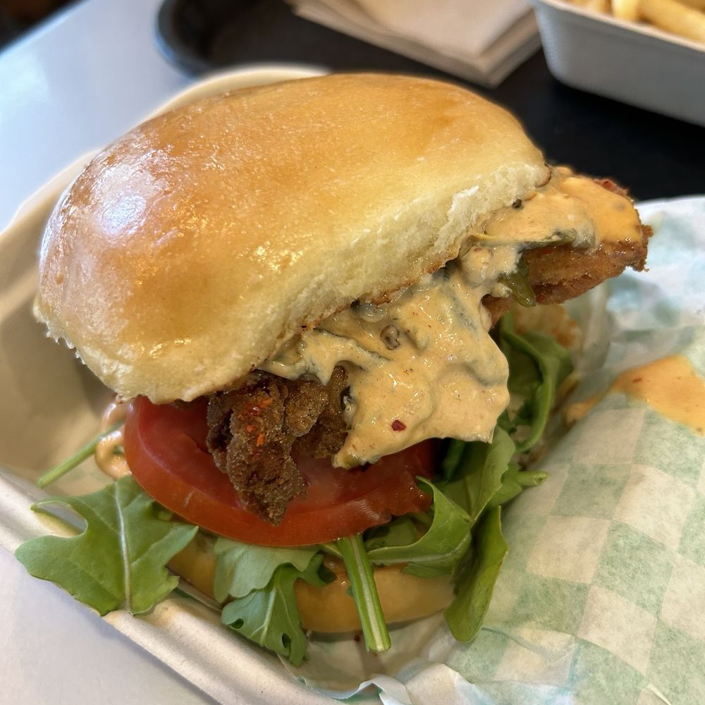 Spicy Chicken Milk Bun: pickled chilis, southwest dressing, lettuce, tomato