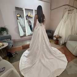 Vow'd Dallas - The back of a wedding dress and the try-on seating area