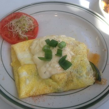 Louie's Cafe - half of Seafood Louie omelet - Breakfast & Brunch Near Me - Baton Rouge, Louisiana Louie's Cafe - half of Seafood Louie omelet - Breakfast & Brunch Near Me - Baton Rouge, Louisiana