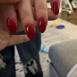 The Nail Parlor - Third ring finger and index finger nails are crooked.