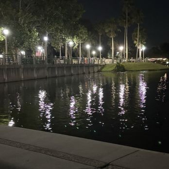 Town Center Celebration - Water view at night. They have rocking chairs to sit - Shopping Centers Near Me - Celebration, Florida Town Center Celebration - Water view at night. They have rocking chairs to sit - Shopping Centers Near Me - Celebration, Florida