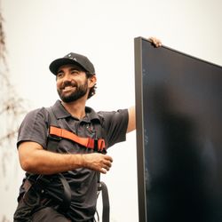 KOTA Energy Group - Kota Solar staff member working at residential solar installation