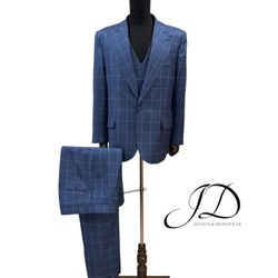 JD Design - Blue checked suit with peaked lapel.