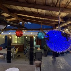 Tiki Trader - Puffer fish hanging in the tiki hut