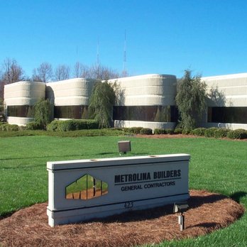 Metrolina Builders - a sign in front of a building - General Contractors Near Me - Charlotte, North Carolina Metrolina Builders - a sign in front of a building - General Contractors Near Me - Charlotte, North Carolina