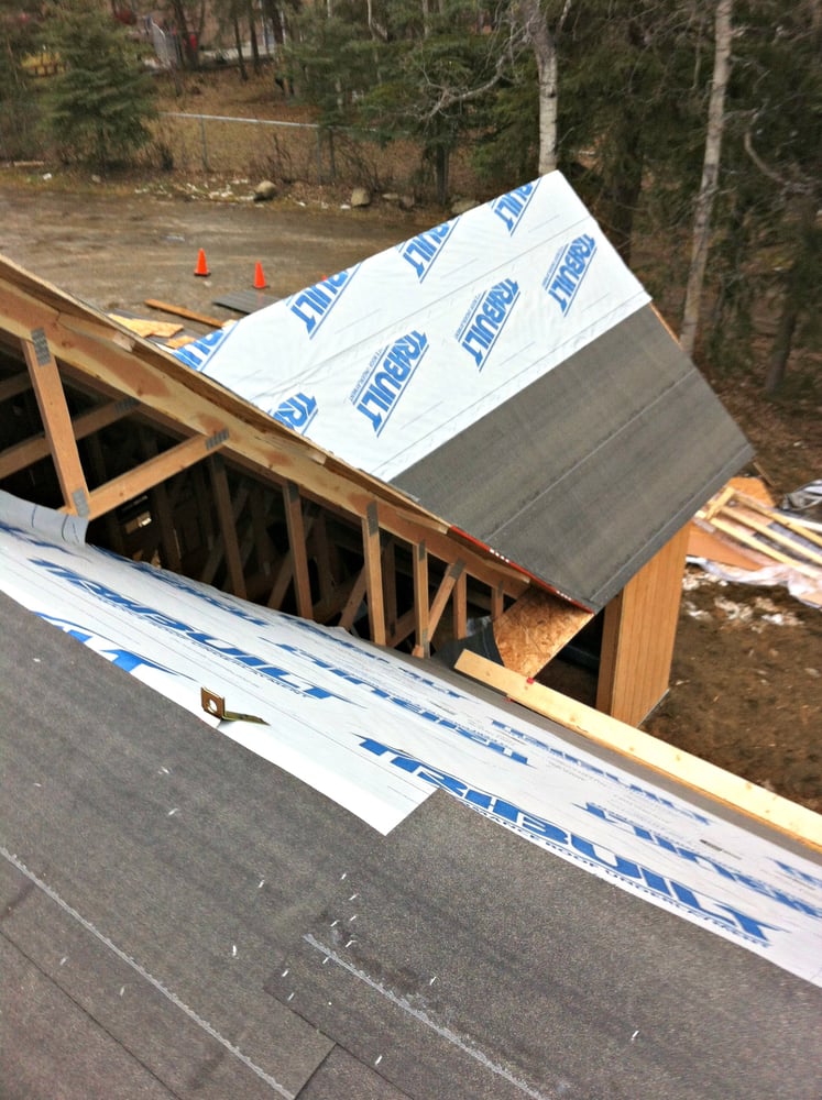 Slide of Storm Proof Roofing