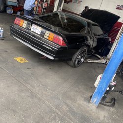Aranda's Transmission - Car getting ready to be lifted