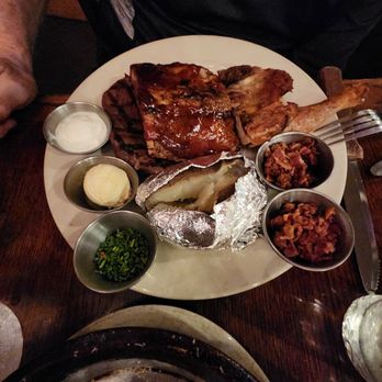 Black Bart's Steakhouse - This was 1/4 chicken, ribs, 6 Oz steak, loaded bake potato with cheese, bacon and sour cream with salad - Steakhouses Near Me - Flagstaff, Arizona